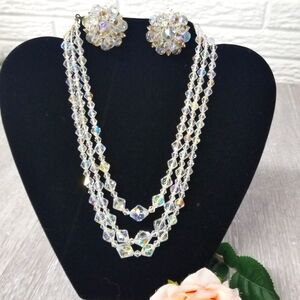 Vintage Aurora Borealis triple strand necklace and clip earrings